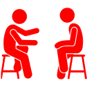 Two red figures sitting and talking.